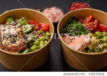 An Asian style bowl with shrimp, edamame, tomatoes, and wakame. A shrimp and vegetable bowl An Asian style bowl with shrimp, edamame, tomatoes, and wakame. A shrimp and vegetable bowl 142635636