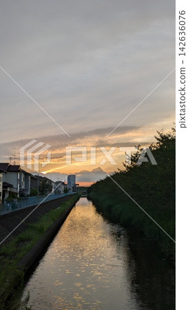 Evening sky and river Evening sky and river 142636076