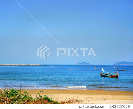 Amazing view on the Indian Ocean and fishing boats at Goa Amazing view on the Indian Ocean and fishing boats at Goa 142637639
