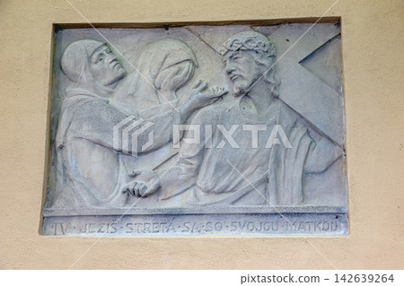 Nitra, Slovakia - May 27, 2024: IV Station Relief Showing Jesus Meeting His Mother Nitra, Slovakia - May 27, 2024: IV Station Relief Showing Jesus Meeting His Mother 142639264