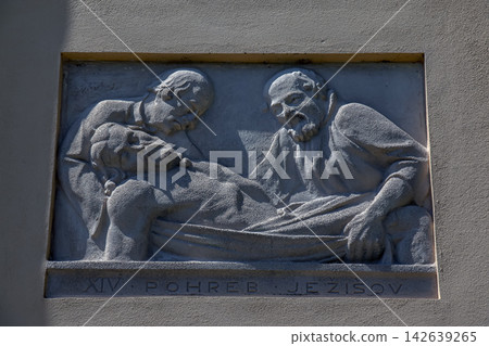 Nitra, Slovakia - May 27, 2024: XIV Station of the Cross Relief Depicting the Burial of Jesus Nitra, Slovakia - May 27, 2024: XIV Station of the Cross Relief Depicting the Burial of Jesus 142639265