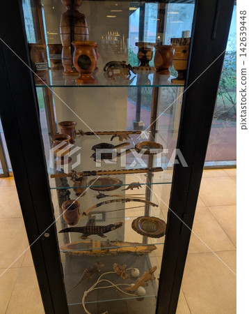 Puerto Iguazu, Argentina - June 24, 2025: Wooden Handicrafts in a Souvenir Shop Display Puerto Iguazu, Argentina - June 24, 2025: Wooden Handicrafts in a Souvenir Shop Display 142639448