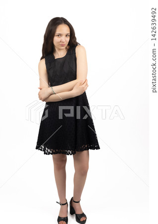 Young woman portrait posing in studio Young woman portrait posing in studio 142639492