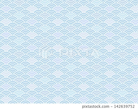 A seamless Japanese pattern background featuring a blue-toned seigaiha (wave) design. A seamless Japanese pattern background featuring a blue-toned seigaiha (wave) design. 142639752