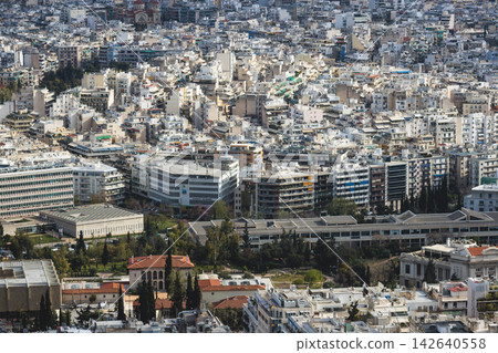 Athens, Attica, Greece, beautiful panoramic view of Athens cityscape, with The Parthenon, mountains, sea and scenery beyond the city, seen from Mount Lycabettus Hill observation deck in a sunny day 142640558