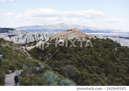 Mount Lycabettus, Athens, Greece, hiking and climbing to Lycabettos hill and Holy Church of Saint George of Lycabettus, Attica, Athens cityscape panorama view in sunny day, Lykavittos Greek landscape Mount Lycabettus, Athens, Greece, hiking and climbing to Lycabettos hill and Holy Church of Saint George of Lycabettus, Attica, Athens cityscape panorama view in sunny day, Lykavittos Greek landscape 142640565