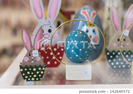 Easter in Greece, caffe and shop decorations, bunnies, multicoloured easter eggs, decorated shopwindow, Easter gifts and souvenirs, showcase, glass case, shopfront decorated in Athens, Attica, Greece Easter in Greece, caffe and shop decorations, bunnies, multicoloured easter eggs, decorated shopwindow, Easter gifts and souvenirs, showcase, glass case, shopfront decorated in Athens, Attica, Greece 142640572