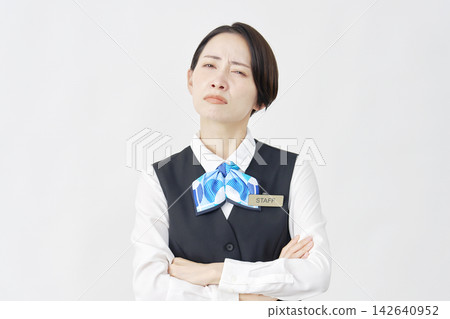 Angry female staff member (receptionist/bank employee) - white background Angry female staff member (receptionist/bank employee) - white background 142640952