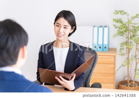 A businessman who makes an interview A businessman who makes an interview 142641388