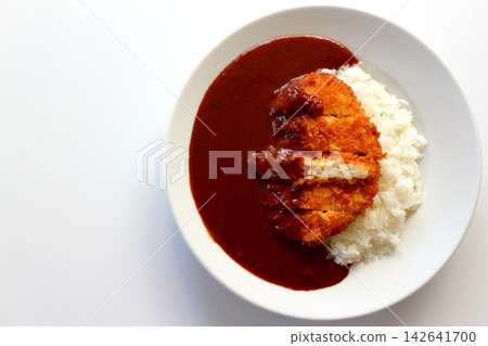 Chicken cutlet curry rice viewed from directly above against a white background. 142641700