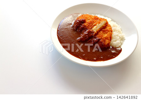 Chicken cutlet curry rice on a white background Chicken cutlet curry rice on a white background 142641892