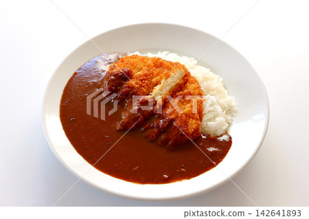 Chicken cutlet curry rice on a white background Chicken cutlet curry rice on a white background 142641893