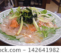 Large platter of sashimi carpaccio 142641982