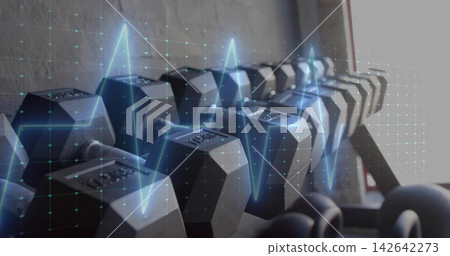 Displaying hexagonal dumbbells on rack under right light at gym, with cyan ECG grid overlay Displaying hexagonal dumbbells on rack under right light at gym, with cyan ECG grid overlay 142642273