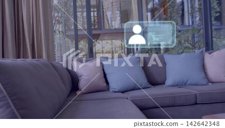 Featuring gray L-shaped sofa dominating living room with glass doors, pastel pillows, UI overlay Featuring gray L-shaped sofa dominating living room with glass doors, pastel pillows, UI overlay 142642348