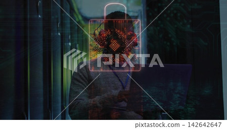 Holding laptop man wearing sweater, lanyard headset checking racks in server room with padlock icon Holding laptop man wearing sweater, lanyard headset checking racks in server room with padlock icon 142642647
