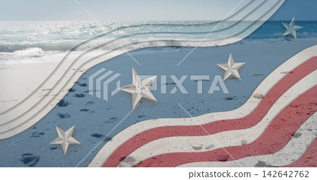 Showing sandy shoreline with footprints, pebbles at shore, overlaying red-white stripes and stars Showing sandy shoreline with footprints, pebbles at shore, overlaying red-white stripes and stars 142642762