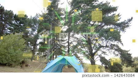 Showing centered blue dome tent sitting on forest clearing with pine trees, digital overlays Showing centered blue dome tent sitting on forest clearing with pine trees, digital overlays 142643084