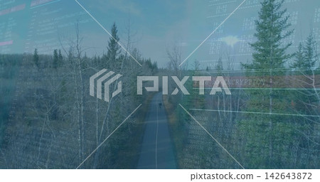 Cycling teen male riding bike down paved trail through trees, wearing helmet, ENCRYPTION overlay Cycling teen male riding bike down paved trail through trees, wearing helmet, ENCRYPTION overlay 142643872