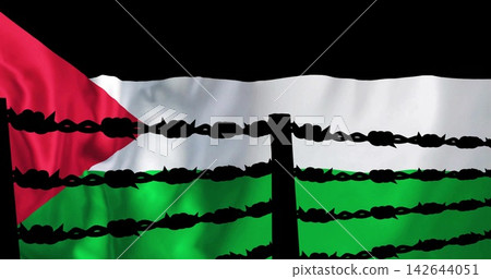 Displaying Palestinian flag rippling in studio, with barbed wire, fence post and dark backdrop Displaying Palestinian flag rippling in studio, with barbed wire, fence post and dark backdrop 142644051