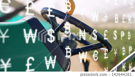 Displaying black 3-spoke wheel with gear lever and dash on field with green-seat, currency symbols Displaying black 3-spoke wheel with gear lever and dash on field with green-seat, currency symbols 142644161