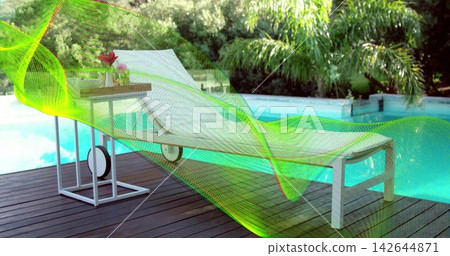 Showing white chaise sitting at backyard pool on wood deck, with side-table tray and neon overlay 142644871