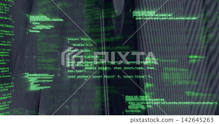 Glowing neon-green source code overlay filling dark workspace display with ribbed panel reflections Glowing neon-green source code overlay filling dark workspace display with ribbed panel reflections 142645263