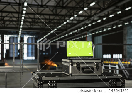 Green screen laptop in empty large-scale engineering plant, industrial space. Warehouse environment includes heavy machinery and steel structures, automation for production line. Green screen laptop in empty large-scale engineering plant, industrial space. Warehouse environment includes heavy machinery and steel structures, automation for production line. 142645293