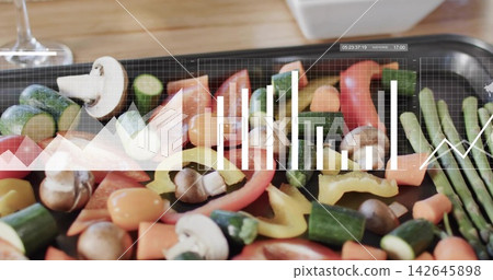 Featuring black tray with peppers, tomatoes, asparagus on wooden counter with data overlay Featuring black tray with peppers, tomatoes, asparagus on wooden counter with data overlay 142645898