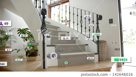 Curving carpeted stairs with iron balusters and wood handrail rising in foyer, displaying AR tags Curving carpeted stairs with iron balusters and wood handrail rising in foyer, displaying AR tags 142646016
