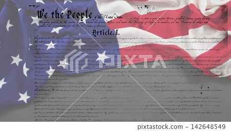 Displaying draped American flag over Constitution parchment, showing We People heading, Article I Displaying draped American flag over Constitution parchment, showing We People heading, Article I 142648549