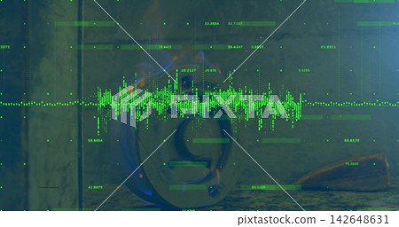 Showing dark metal emblem sitting on rough table in studio showing neon waveform and data readouts Showing dark metal emblem sitting on rough table in studio showing neon waveform and data readouts 142648631