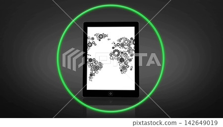 Displaying black tablet showing white-screen gear map in studio with green neon ring reflecting Displaying black tablet showing white-screen gear map in studio with green neon ring reflecting 142649019