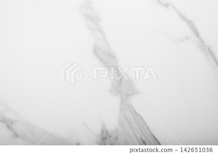 Smooth marble background features delicate patterns and shades. Elegant design concept Smooth marble background features delicate patterns and shades. Elegant design concept 142651036