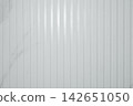 Vertical striped wall enhances the look of contemporary interiors 142651050