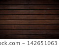 Smooth dark wooden surface offers rich texture for various uses 142651063