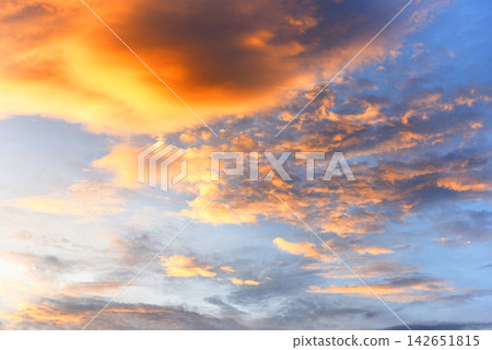 Dramatic sky sunset or sunrise colorful red and orange sky over cloud beautiful multicolor fiery background Dramatic sky sunset or sunrise colorful red and orange sky over cloud beautiful multicolor fiery background 142651815