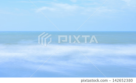 A turbulent sea and an ambiguous horizon, smoothly rendered with long exposure. A turbulent sea and an ambiguous horizon, smoothly rendered with long exposure. 142652380