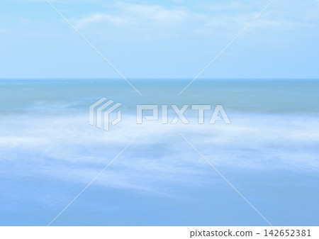 A turbulent sea and an ambiguous horizon, smoothly rendered with long exposure. A turbulent sea and an ambiguous horizon, smoothly rendered with long exposure. 142652381