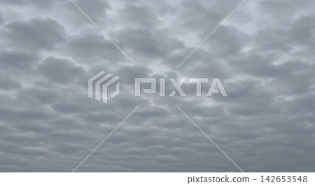 Cloudy sky with rounded stratocumulus clouds Cloudy sky with rounded stratocumulus clouds 142653548