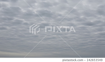Cloudy sky with rounded stratocumulus clouds Cloudy sky with rounded stratocumulus clouds 142653549