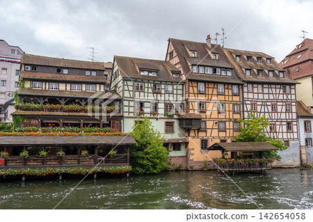 Traditional restaurant on the riverside in Petite France, Strasbourg Traditional restaurant on the riverside in Petite France, Strasbourg 142654058