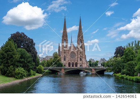 Saint Paul Church along the Ill river in Strasbourg Saint Paul Church along the Ill river in Strasbourg 142654061