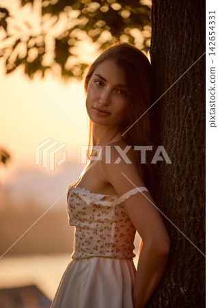 Slavic Woman in Lace Dress by Tree Slavic Woman in Lace Dress by Tree 142654331