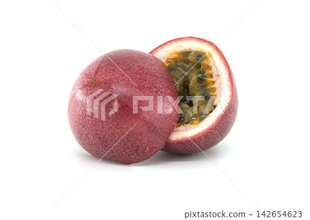 Ripe passion fruit cut in half revealing juicy pulp and seeds on white background Ripe passion fruit cut in half revealing juicy pulp and seeds on white background 142654623