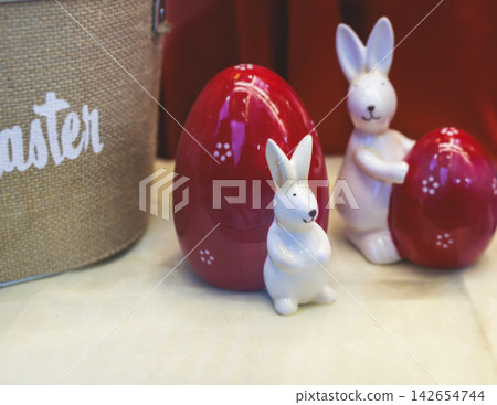 Easter in Greece, caffe and shop decorations, bunnies, multicoloured easter eggs, decorated shopwindow, Easter gifts and souvenirs, showcase, glass case, shopfront decorated in Athens, Attica, Greece Easter in Greece, caffe and shop decorations, bunnies, multicoloured easter eggs, decorated shopwindow, Easter gifts and souvenirs, showcase, glass case, shopfront decorated in Athens, Attica, Greece 142654744