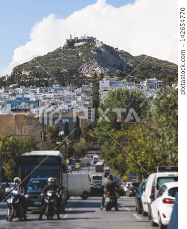 Mount Lycabettus, Athens, Greece, hiking and climbing to Lycabettos hill and Holy Church of Saint George of Lycabettus, Attica, Athens cityscape panorama view in sunny day, Lykavittos Greek landscape Mount Lycabettus, Athens, Greece, hiking and climbing to Lycabettos hill and Holy Church of Saint George of Lycabettus, Attica, Athens cityscape panorama view in sunny day, Lykavittos Greek landscape 142654770