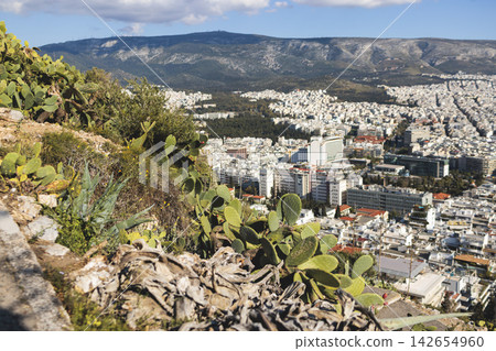 Mount Lycabettus, Athens, Greece, hiking and climbing to Lycabettos hill and Holy Church of Saint George of Lycabettus, Attica, Athens cityscape panorama view in sunny day, Lykavittos Greek landscape Mount Lycabettus, Athens, Greece, hiking and climbing to Lycabettos hill and Holy Church of Saint George of Lycabettus, Attica, Athens cityscape panorama view in sunny day, Lykavittos Greek landscape 142654960