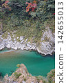 A river flowing through autumn leaves 142655013