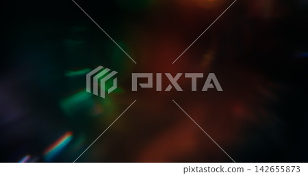 Blur red texture. Lens glare. Defocused blue neon color optical vibrant gleam illuminated flash on abstract visual dark black bokeh art background. Blur red texture. Lens glare. Defocused blue neon color optical vibrant gleam illuminated flash on abstract visual dark black bokeh art background. 142655873